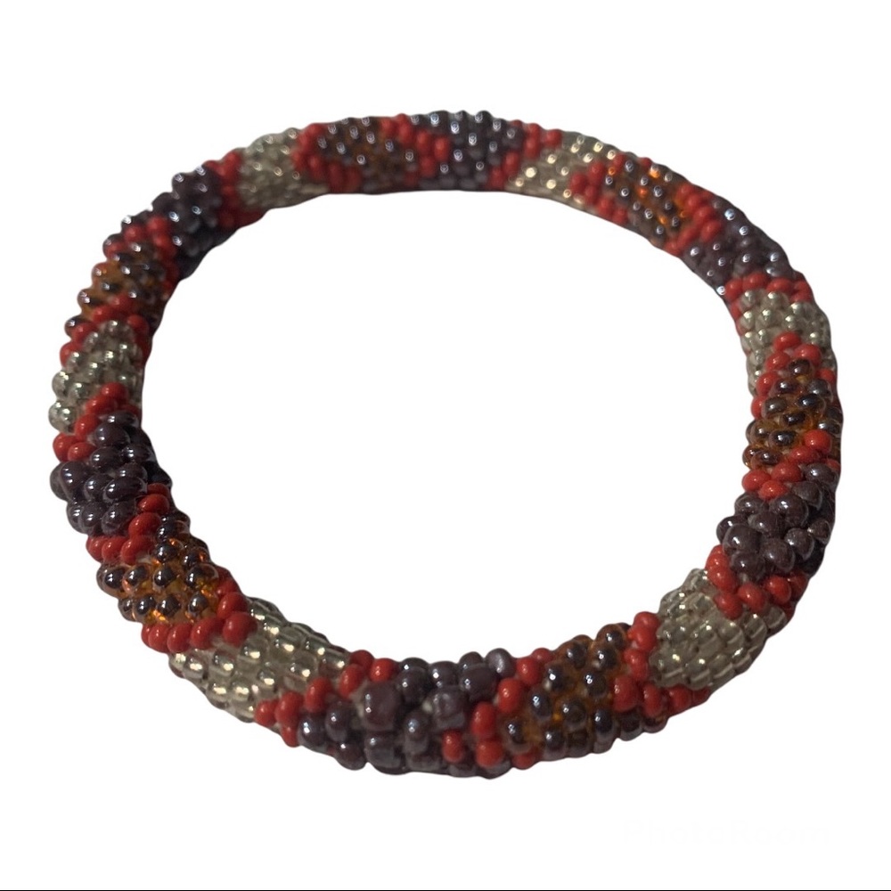 5 for 20 Sashkaco orange bracelet with purple & silver beaded detail